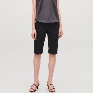 COS tailored shorts with press folds sz2